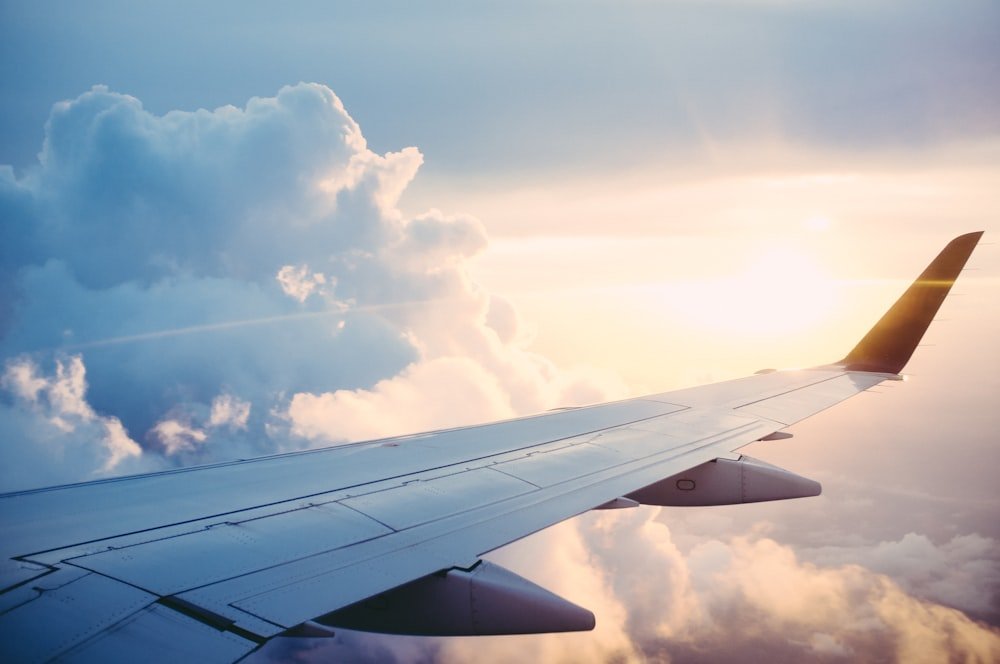 Airplane above the clouds